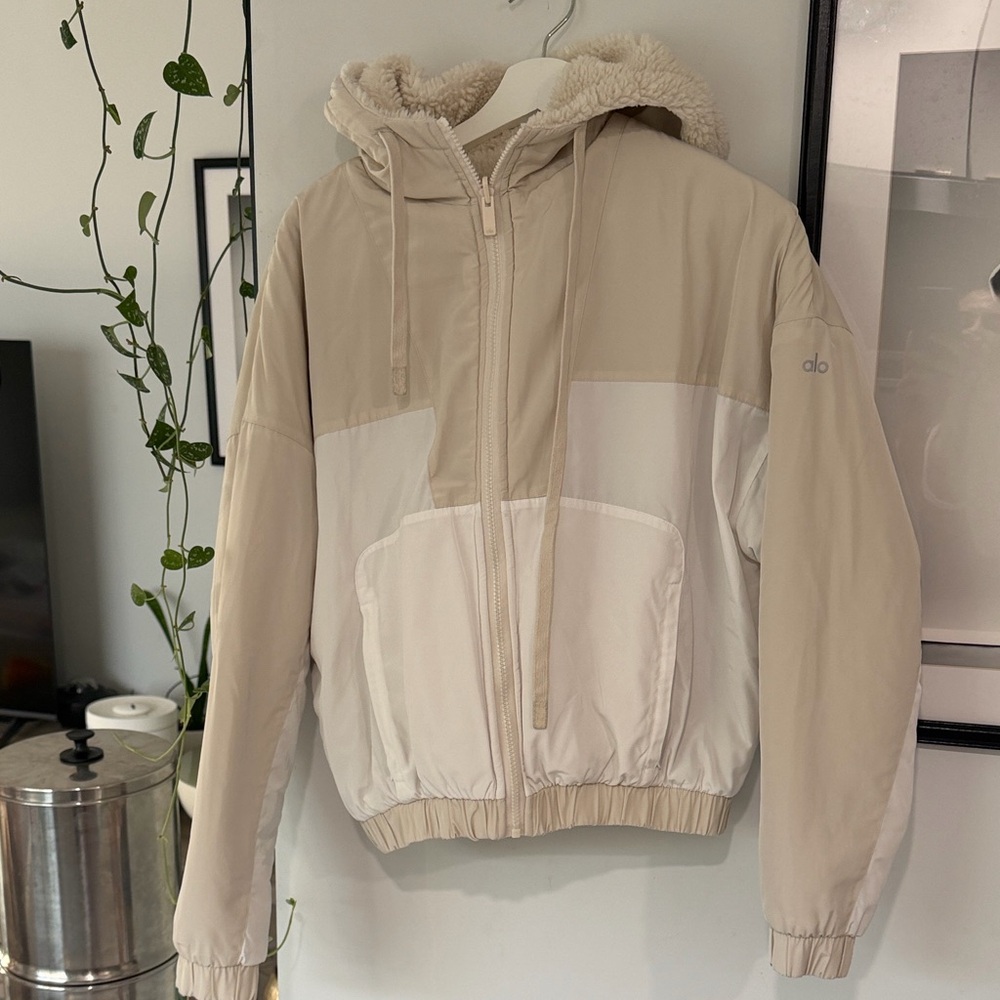 Alo Yoga Two-Tone reversible Hooded Jacket.